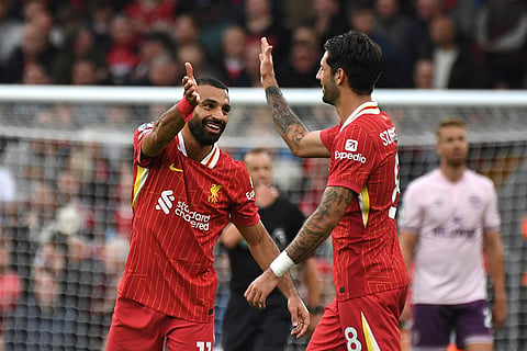 Premier League 2024-25: Liverpool's Mohamed Salah celebrates with Dominik Szoboszlai, right, after scoring his side's second goal